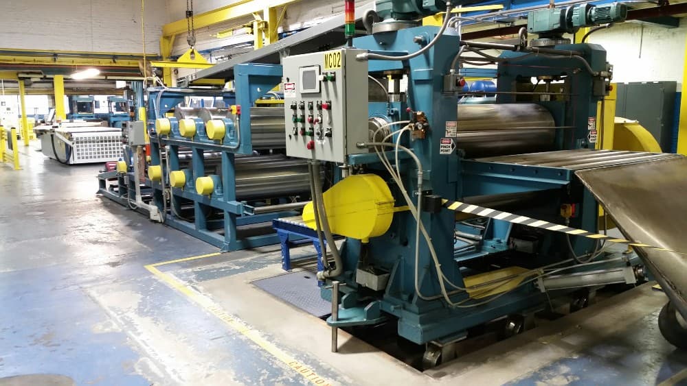 16" x 48" 2-roll vertical roller bearing calender with 6 cooling drums. New in 2015.